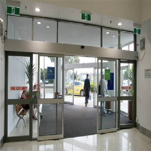 What are the key components of an automatic sliding door controller system?